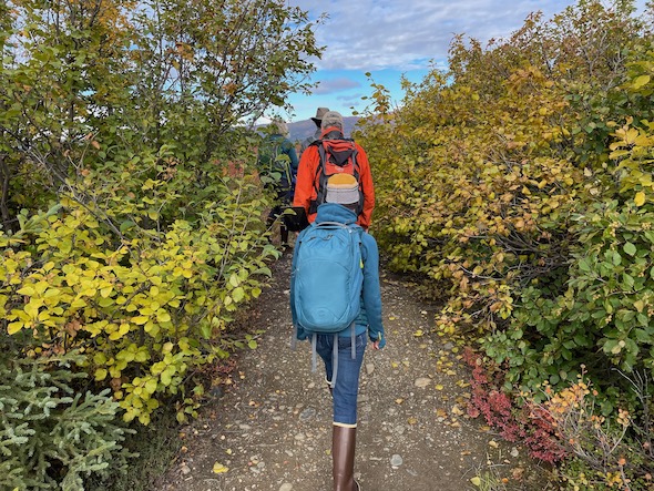 Polar Explorer team walking near Healy, AK